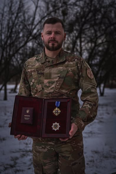 Сергій Жуковін з нагородою